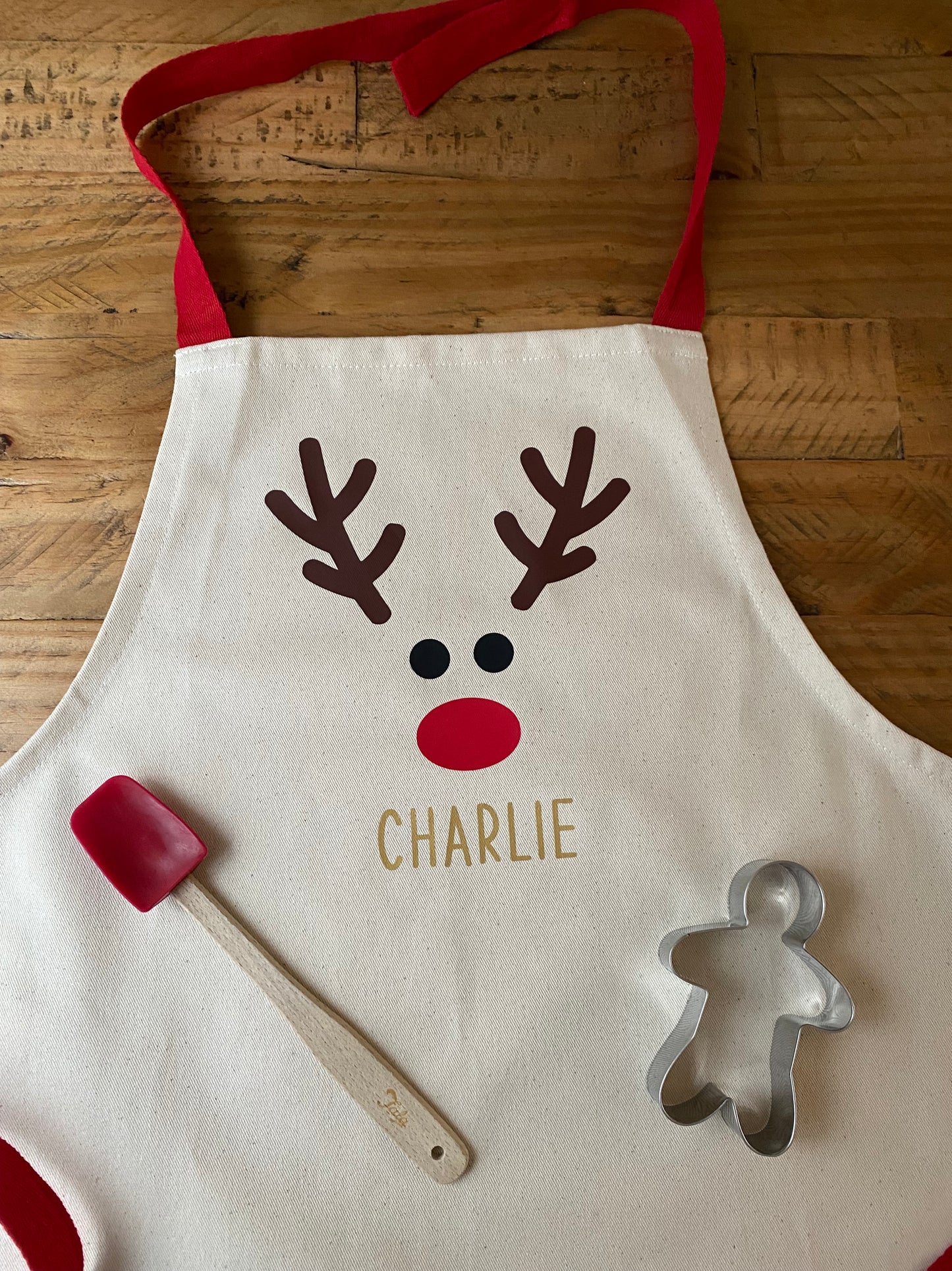 Personalised festive children’s apron- Red nose Reindeer