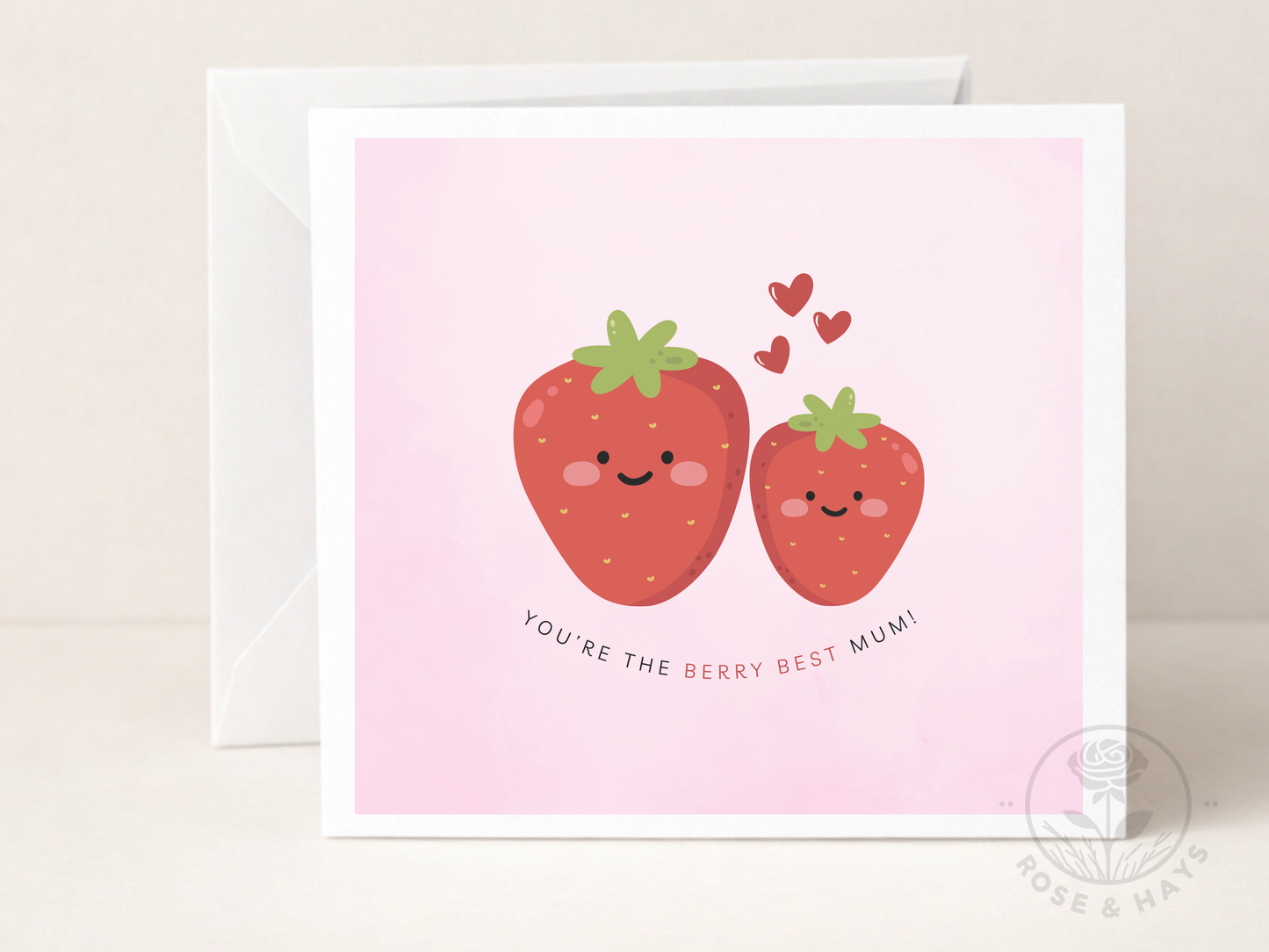Greeting card with two smiling strawberries and hearts on a pink background