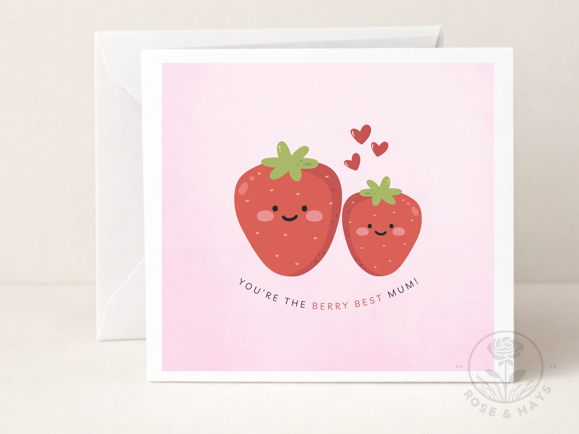 Greeting card with two smiling strawberries and hearts on a pink background