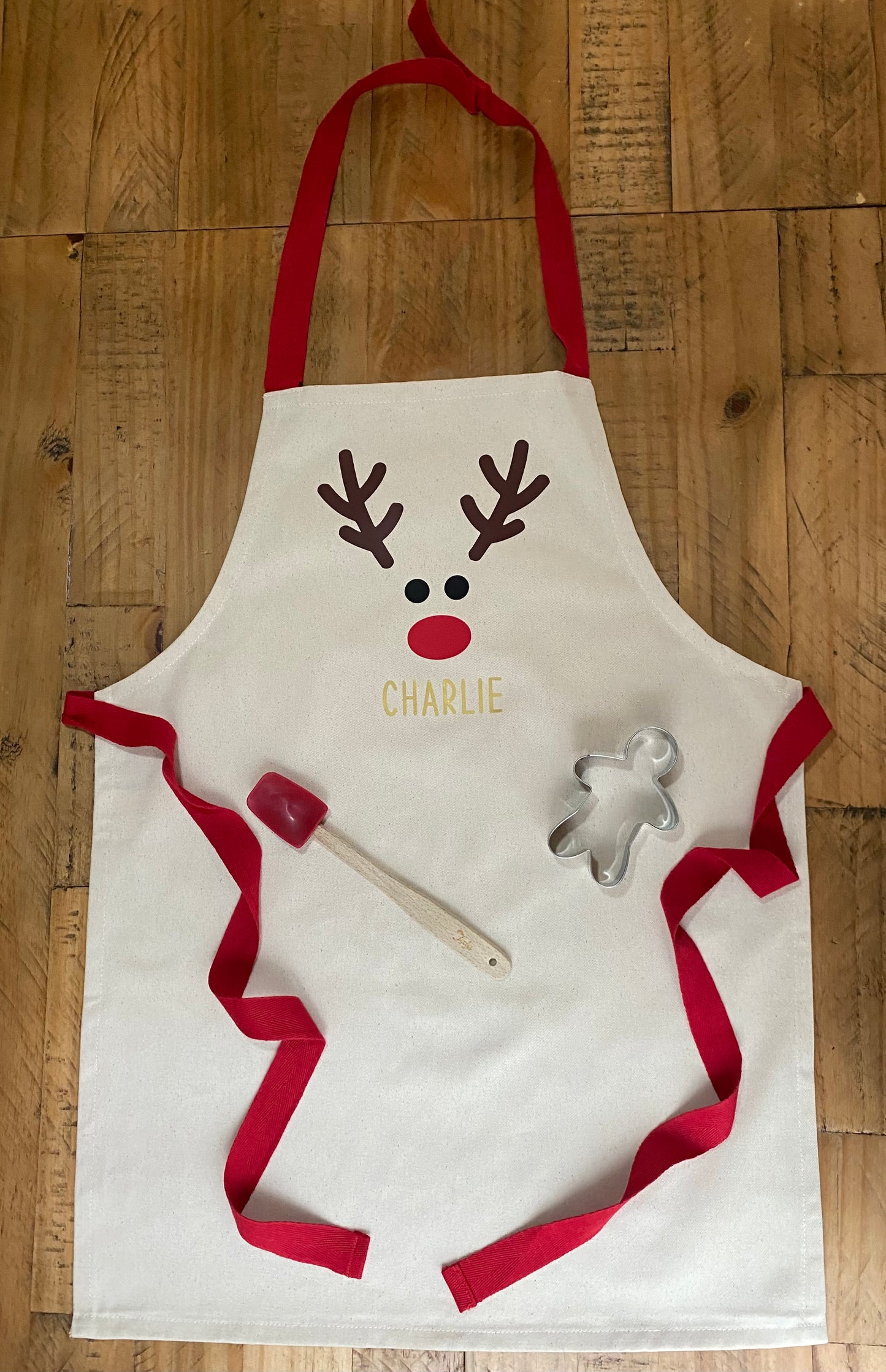 Personalised festive children’s apron- Red nose Reindeer