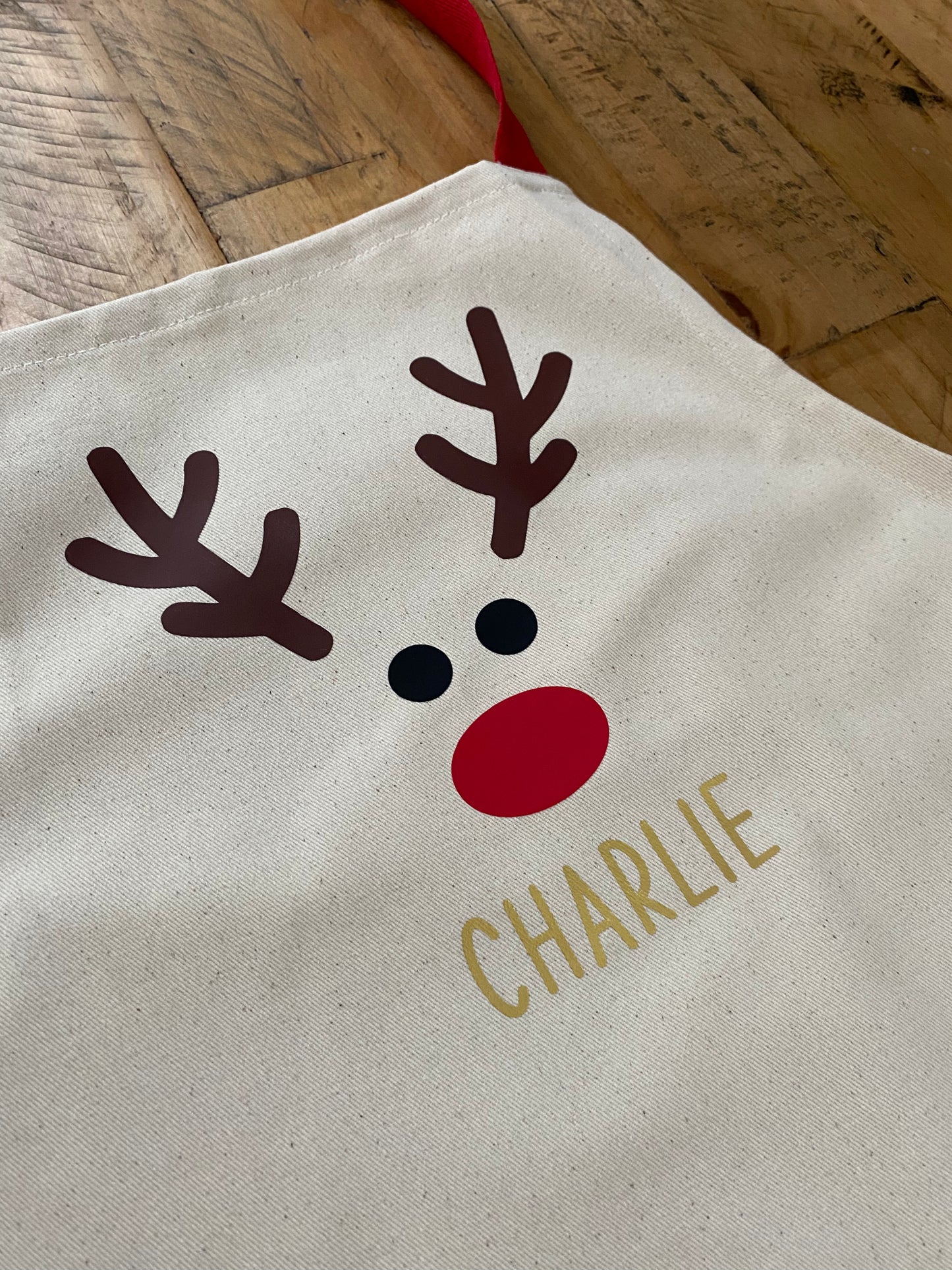 Personalised festive children’s apron- Red nose Reindeer