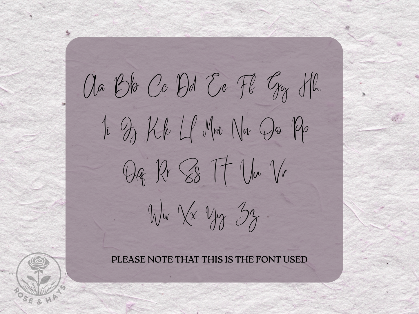 Keyboard layout with a decorative font on a textured grey background demonstrating the font used