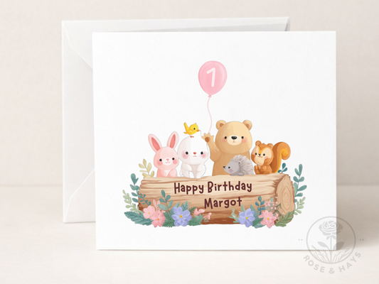 Birthday card with cartoon animals around a log, featuring the number 1 balloon and text 'Happy Birthday Margot'.