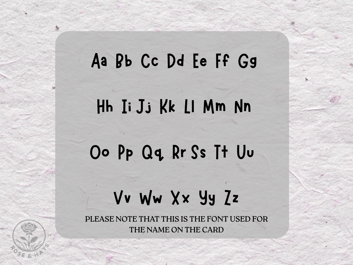 Alphabet card with black letters on a textured gray background